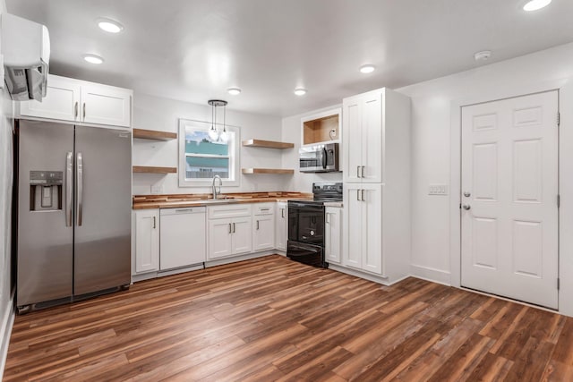 107 Shady St, Summertown, TN 38483 - kitchen with stainless steel appliances, open shelves, a sink, dark wood finished floors, and white cabinetry