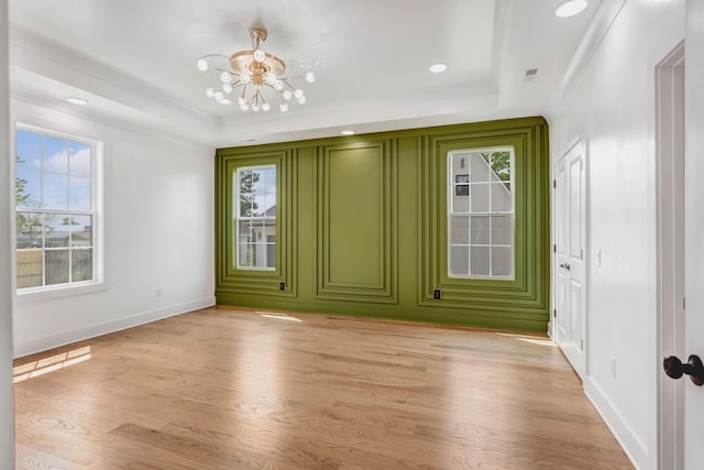 107 Shady St, Summertown, TN 38483 - unfurnished room featuring a chandelier, light wood-style flooring, baseboards, a raised ceiling, and recessed lighting