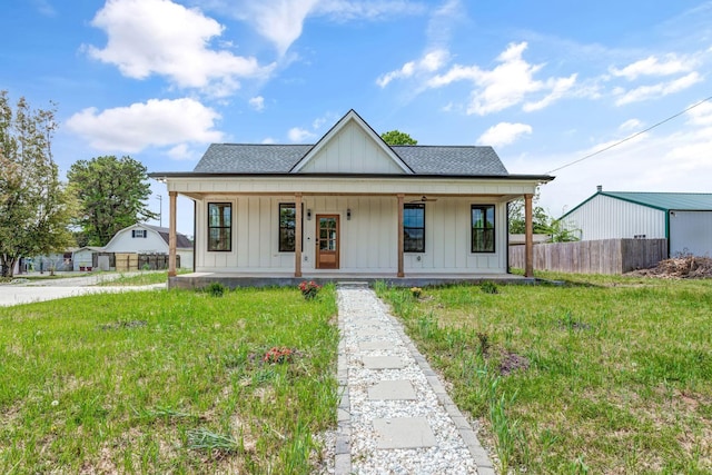 107 Shady St, Summertown, TN 38483 - modern farmhouse with board and batten siding, covered porch, and a shingled roof
