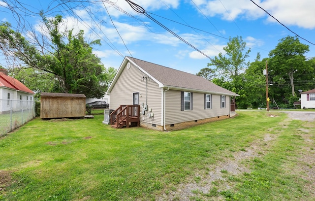 914 Woodland St, Clarksville, TN 37040 - view of property exterior featuring crawl space, a storage shed, and an outdoor structure
