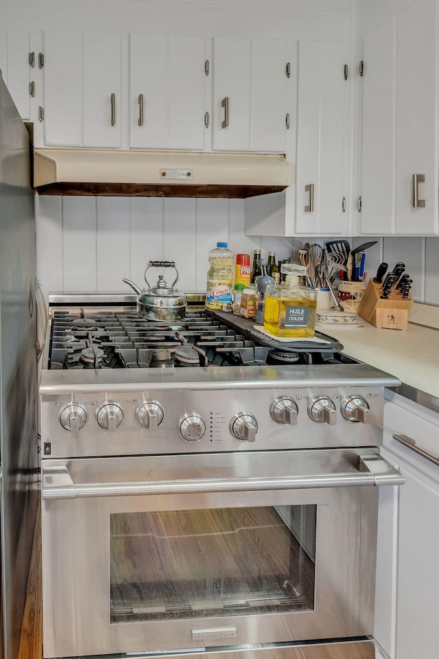 1008 Downey Dr, Nashville, TN 37205 - kitchen view of stainless steel range, white cabinets, and light countertops