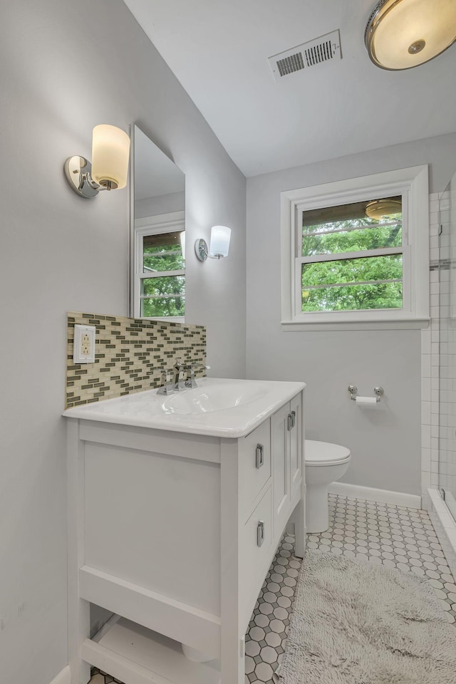 1008 Downey Dr, Nashville, TN 37205 - full bathroom with vanity, backsplash, and a shower