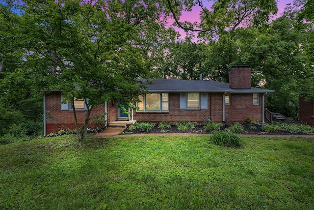 1008 Downey Dr, Nashville, TN 37205 - view of front of property with a yard, a chimney, and brick siding