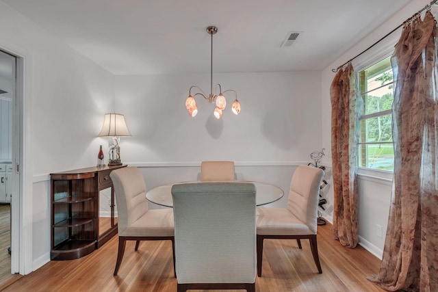 1008 Downey Dr, Nashville, TN 37205 - dining area featuring a chandelier and wood finished floors