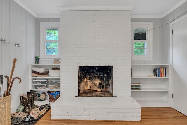 1008 Downey Dr, Nashville, TN 37205 - detailed view of crown molding, wood finished floors, and a brick fireplace