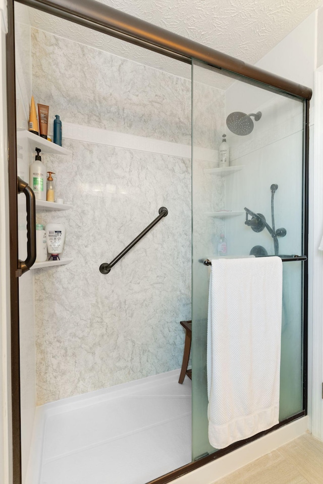 bathroom with a stall shower
