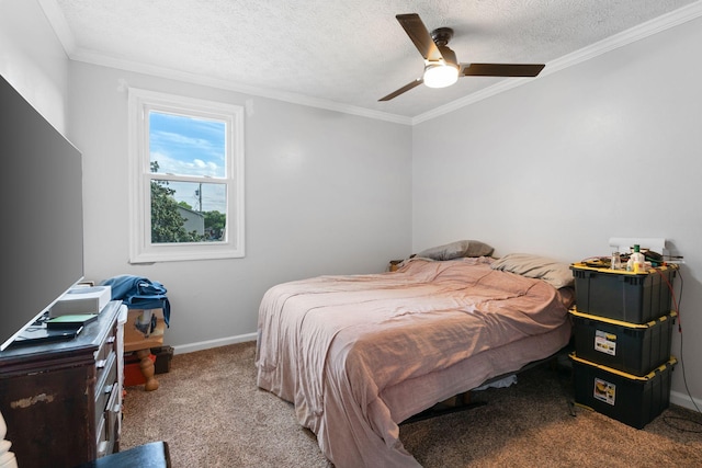 carpeted bedroom with baseboards, a textured ceiling, a ceiling fan, and crown molding