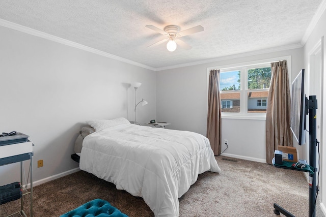 bedroom with carpet flooring, a textured ceiling, baseboards, crown molding, and ceiling fan