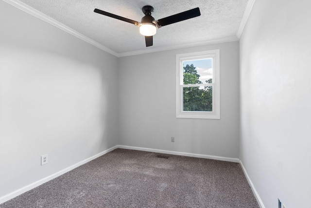 carpeted empty room with a textured ceiling, crown molding, ceiling fan, and baseboards