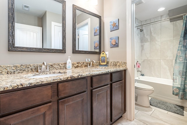 full bath with shower / bath combo, double vanity, toilet, and tile patterned flooring