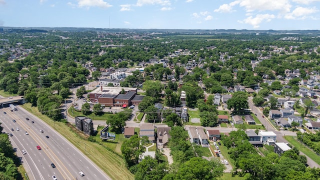 aerial view of residential area featuring a main thoroughfare