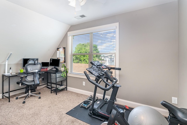 home office with a ceiling fan, vaulted ceiling, carpet floors, and baseboards