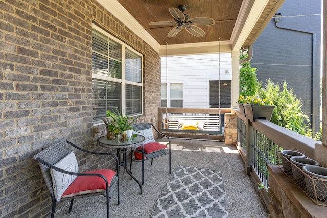 balcony featuring ceiling fan and covered porch