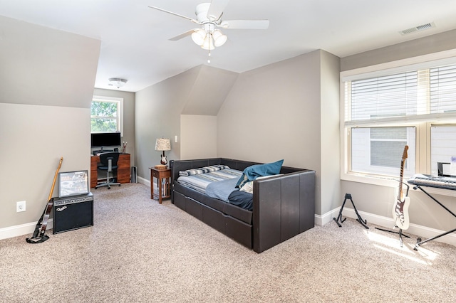 bedroom with carpet floors, baseboards, an office area, ceiling fan, and lofted ceiling
