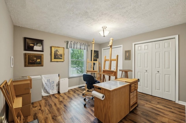 421 Robertson Dr, Smyrna, TN 37167 - office with dark wood-type flooring, a textured ceiling, and baseboards
