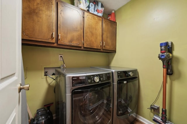 421 Robertson Dr, Smyrna, TN 37167 - laundry room with cabinet space and washing machine and dryer
