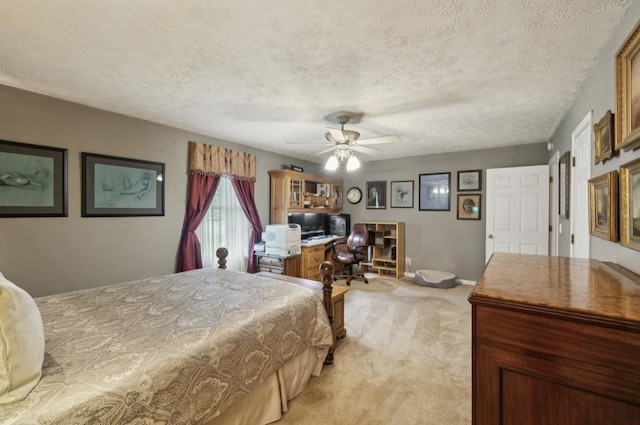 421 Robertson Dr, Smyrna, TN 37167 - bedroom with light carpet, a textured ceiling, an office area, and a ceiling fan