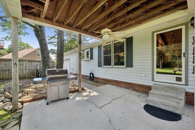 421 Robertson Dr, Smyrna, TN 37167 - view of patio / terrace with a grill, fence, ceiling fan, and a garage
