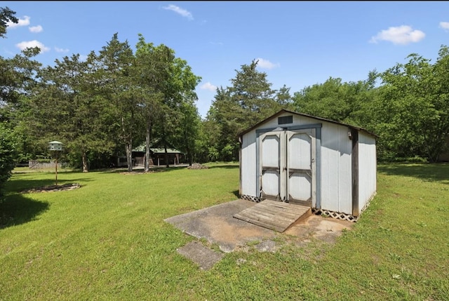 421 Robertson Dr, Smyrna, TN 37167 - view of shed featuring view of wooded area