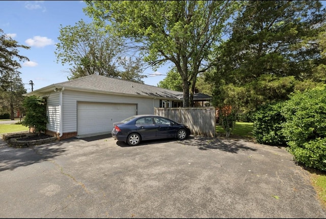421 Robertson Dr, Smyrna, TN 37167 - garage with asphalt driveway