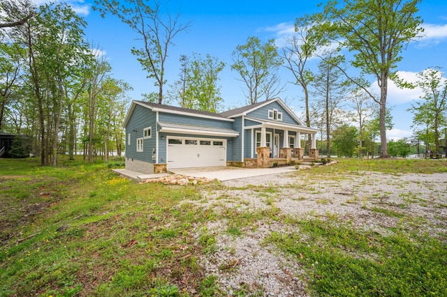 61 Sunset Ct, Tracy City, TN 37387 - view of front of property featuring a porch, a garage, and driveway