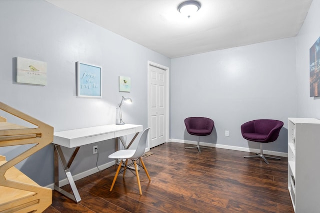 office space featuring wood finished floors and baseboards