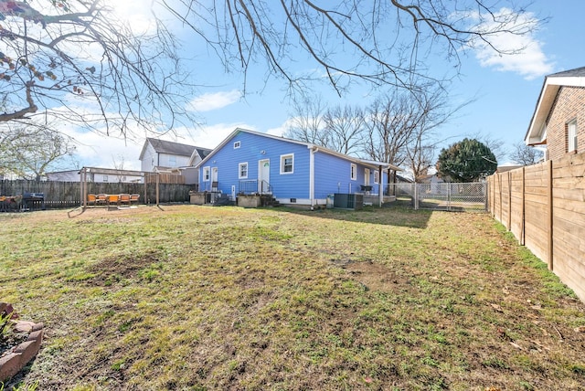 view of yard with central AC
