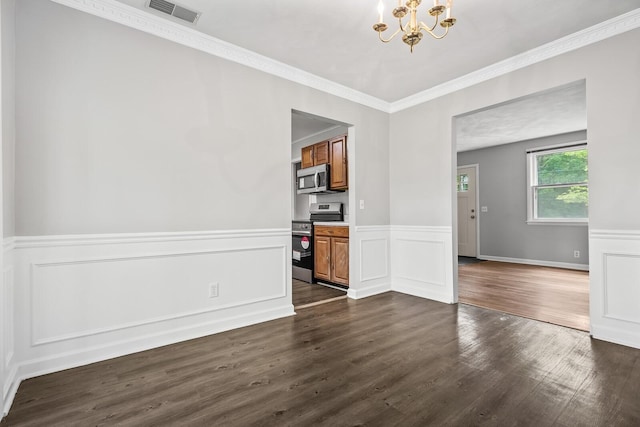 1003 Copper Still Cir, Kingston Springs, TN 37082 - unfurnished room with a chandelier, dark wood finished floors, ornamental molding, a wainscoted wall, and a decorative wall