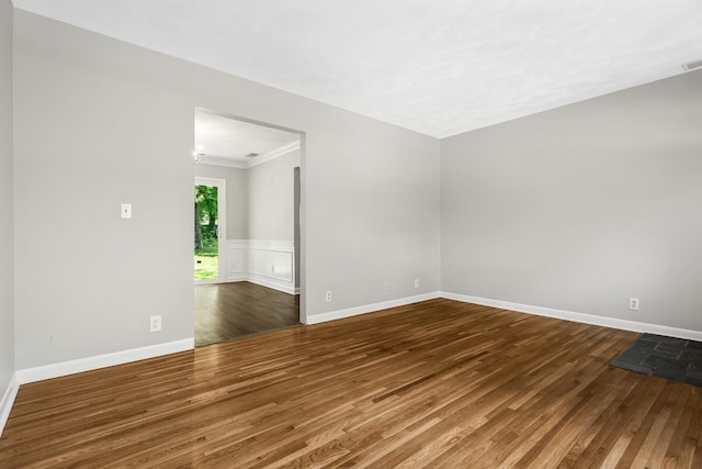 1003 Copper Still Cir, Kingston Springs, TN 37082 - empty room with wood finished floors, ornamental molding, and baseboards