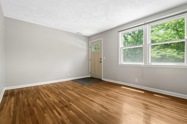 1003 Copper Still Cir, Kingston Springs, TN 37082 - spare room featuring baseboards and wood finished floors
