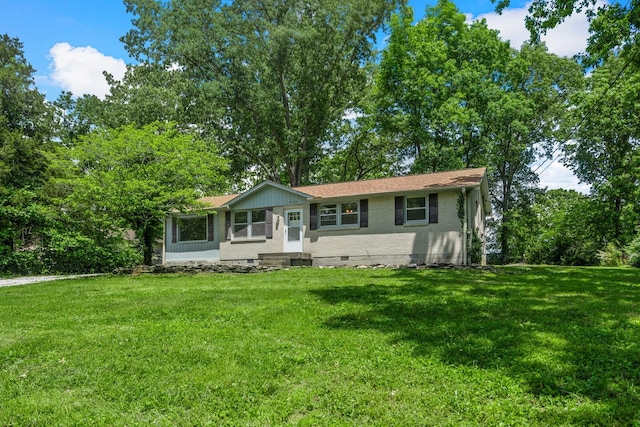 1003 Copper Still Cir, Kingston Springs, TN 37082 - view of front facade featuring a front yard and brick siding