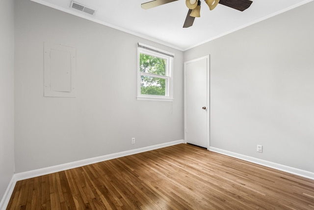 1003 Copper Still Cir, Kingston Springs, TN 37082 - spare room with crown molding, baseboards, a ceiling fan, and wood finished floors