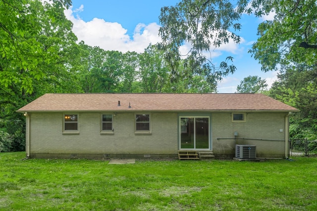 1003 Copper Still Cir, Kingston Springs, TN 37082 - rear view of property with entry steps, brick siding, cooling unit, and a yard