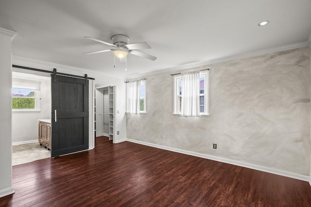 553 Huntington Pkwy, Nashville, TN 37211 - unfurnished bedroom featuring a barn door, crown molding, multiple windows, wood finished floors, and baseboards