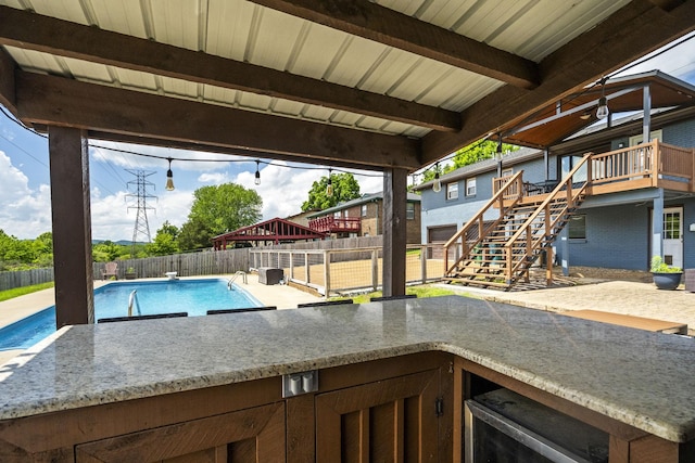 553 Huntington Pkwy, Nashville, TN 37211 - view of pool featuring stairway, a fenced backyard, a patio, and exterior bar