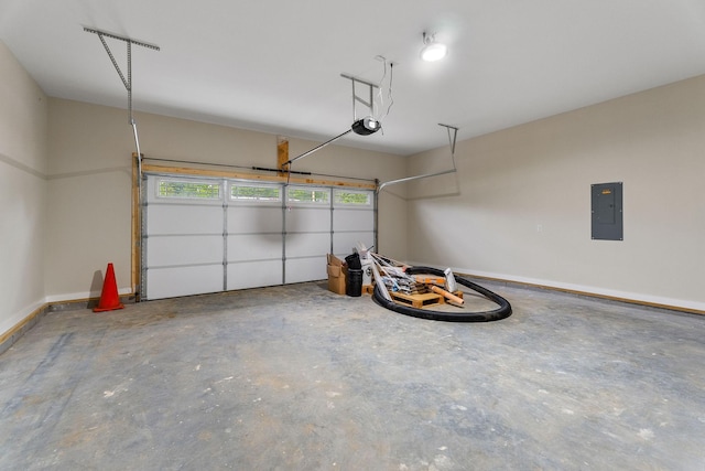 216 Johnson Chapel Rd, Sparta, TN 38583 - garage with a garage door opener, electric panel, and baseboards