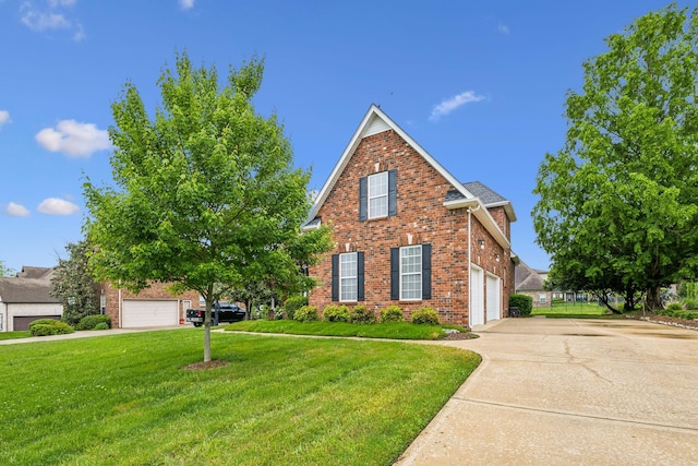 1015 Kingman Ave, Murfreesboro, TN 37129 - traditional-style home with brick siding, concrete driveway, a front lawn, and a garage