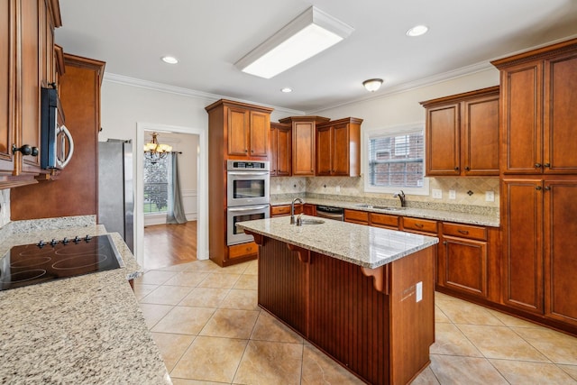 1015 Kingman Ave, Murfreesboro, TN 37129 - kitchen with a sink, appliances with stainless steel finishes, light tile patterned flooring, a chandelier, and ornamental molding