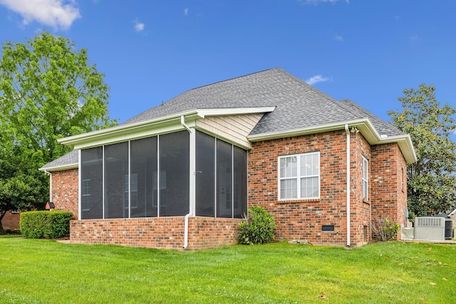 1015 Kingman Ave, Murfreesboro, TN 37129 - view of property exterior featuring brick siding, a sunroom, and a yard
