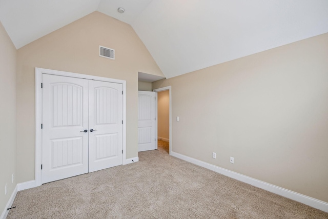 1015 Kingman Ave, Murfreesboro, TN 37129 - unfurnished bedroom with carpet flooring, high vaulted ceiling, a closet, and baseboards