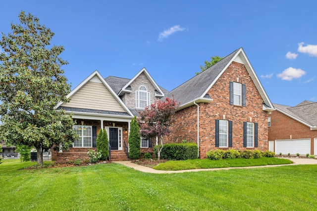 1015 Kingman Ave, Murfreesboro, TN 37129 - traditional-style home with a front yard, brick siding, roof with shingles, and a garage