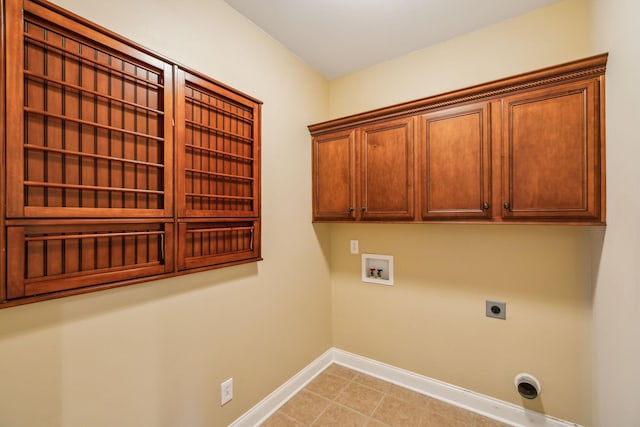 1015 Kingman Ave, Murfreesboro, TN 37129 - washroom featuring hookup for an electric dryer, cabinet space, hookup for a washing machine, and baseboards