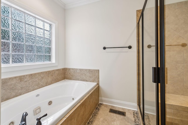 1015 Kingman Ave, Murfreesboro, TN 37129 - bathroom featuring a stall shower, a tub with jets, ornamental molding, and baseboards