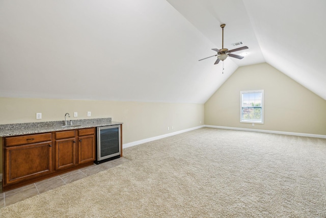 1015 Kingman Ave, Murfreesboro, TN 37129 - bonus room with beverage cooler, bar with sink, lofted ceiling, a ceiling fan, and baseboards