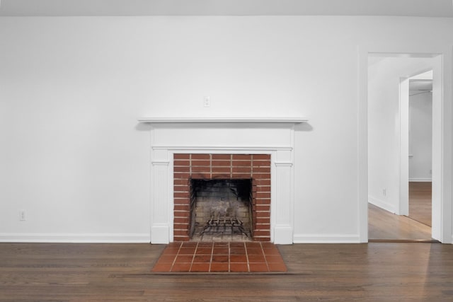2851 Cooper Creek Rd, Woodlawn, TN 37191 - detailed view of wood finished floors, a tiled fireplace, and baseboards