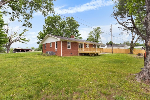 2851 Cooper Creek Rd, Woodlawn, TN 37191 - back of property with brick siding, a chimney, a deck, and central air condition unit