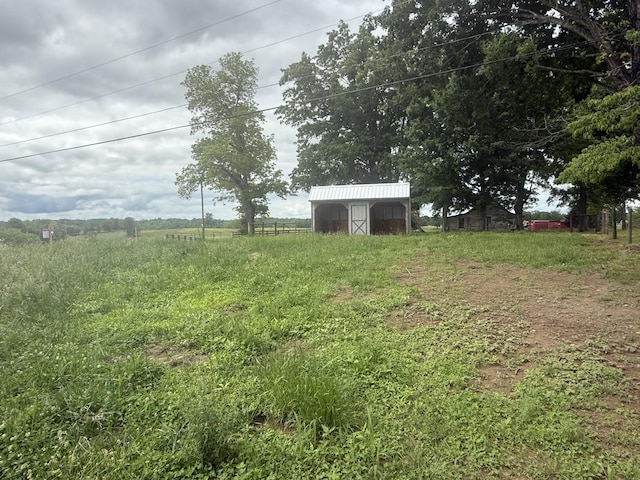 2851 Cooper Creek Rd, Woodlawn, TN 37191 - view of yard featuring an outdoor structure and a rural view