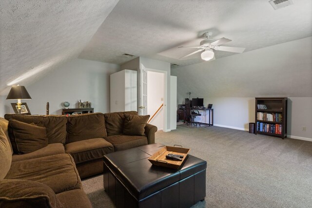 7104 Elrod Rd, Fairview, TN 37062 - living room with vaulted ceiling, baseboards, carpet, a textured ceiling, and ceiling fan