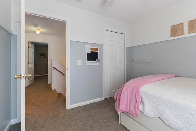 7104 Elrod Rd, Fairview, TN 37062 - bedroom with carpet floors, a closet, baseboards, and ceiling fan