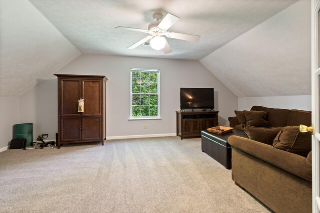 7104 Elrod Rd, Fairview, TN 37062 - living room featuring lofted ceiling, light colored carpet, baseboards, and ceiling fan